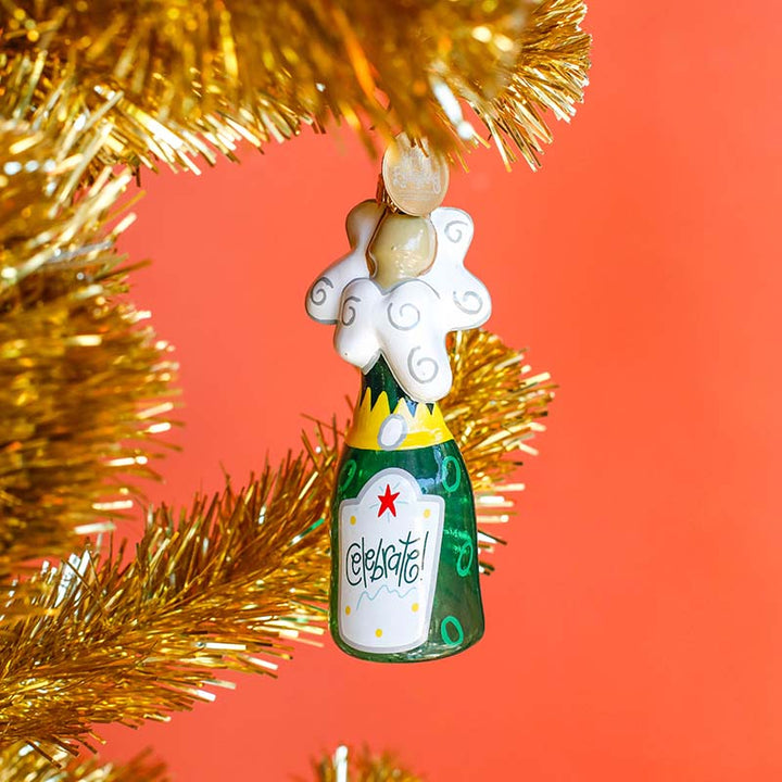 Shaped Ornament Champagne Design on Gold Tinsel Tree