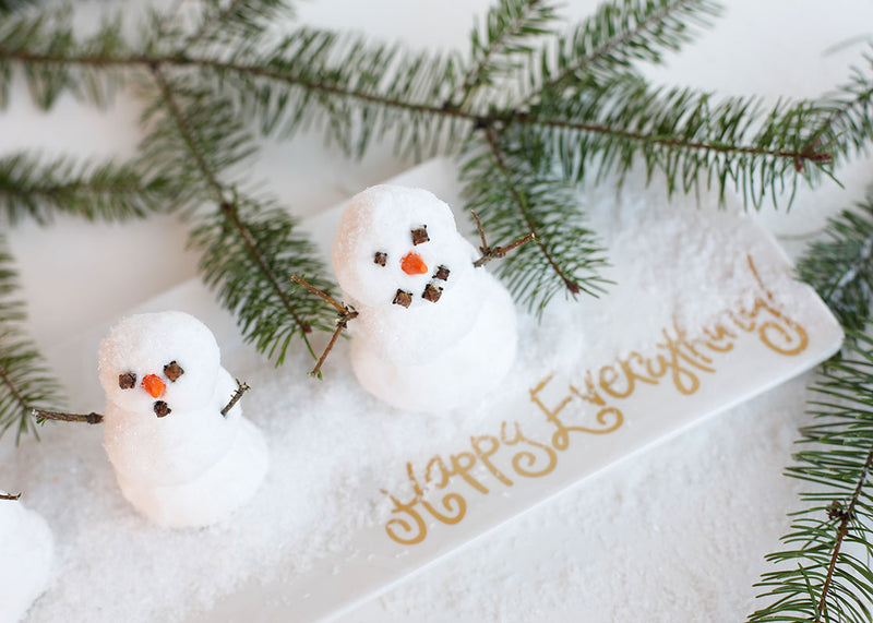 Miniature Snowmen Displayed as Home Decor on Skinny Tray with Subtle White Circles