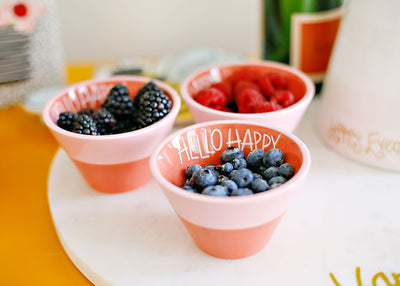 Tablescape of Hello Happy Serveware with Persimmon Small Appetizer Bowls