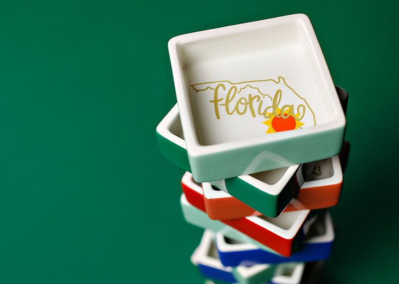 Stack of State Motif Trinket Bowls Topped by Florida