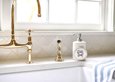 White Small Dot Mini Soap Pump with Mini Attachment Beside Kitchen Sink