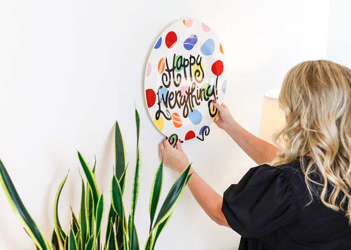 Big Dot Happy Everything! Big Plate Displayed on Wall as Home Decor Using Black Swirl Plate Stand