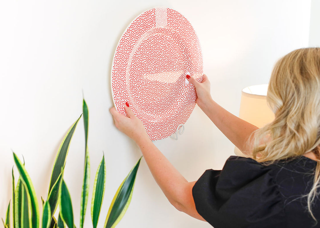Red Small Dot Big Serving Platter Displayed on Wall With Plate Stand White Swirl Design
