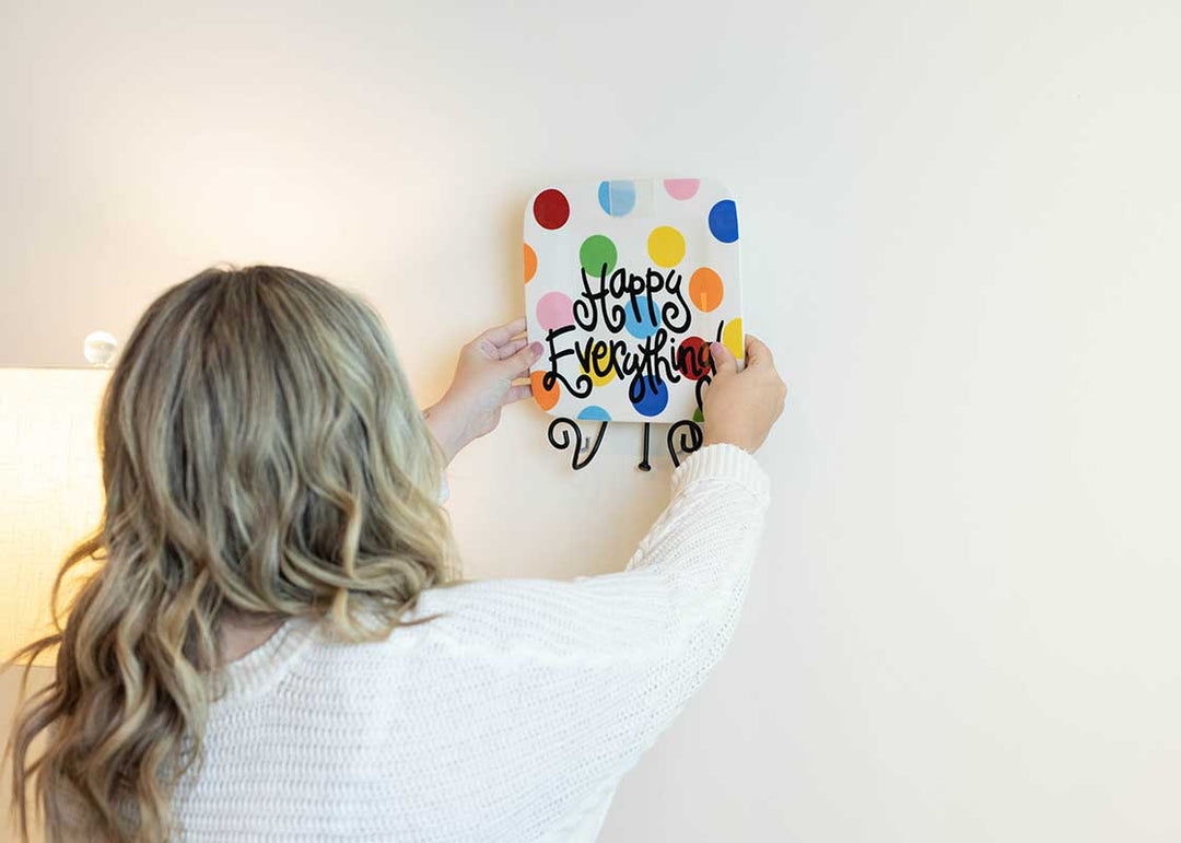 Big Dot Mini Platter Displayed on Wall with Black Swirl Plate Stand