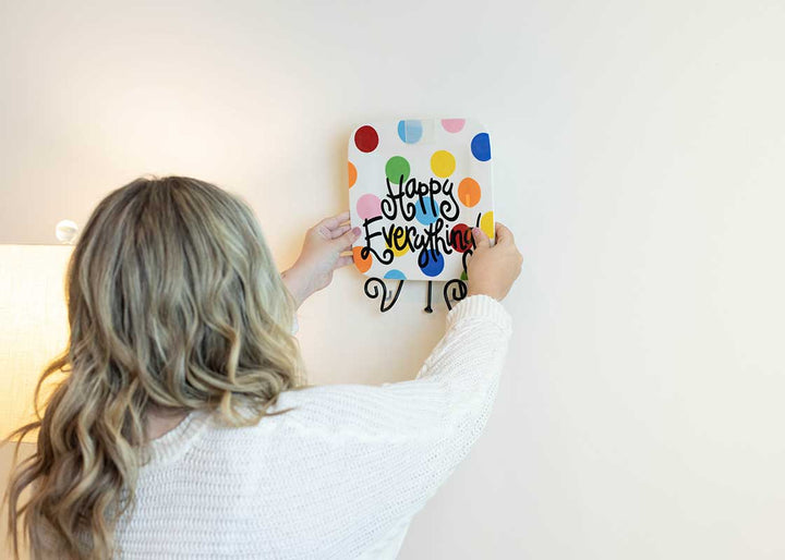 Big Dot Mini Platter Displayed on Wall with Black Swirl Plate Stand