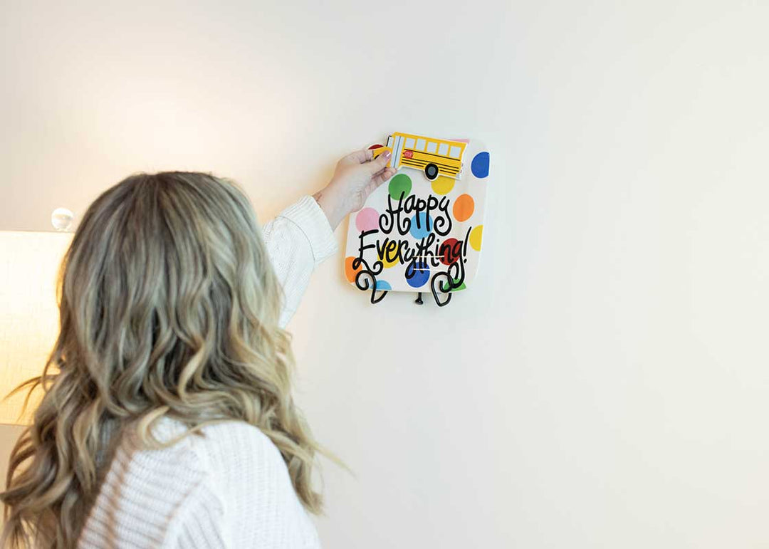Bus Mini Attachment Added to Big Dot Mini Square Platter Displayed as Home Decor with Hanging Black Swirl Plate Stand
