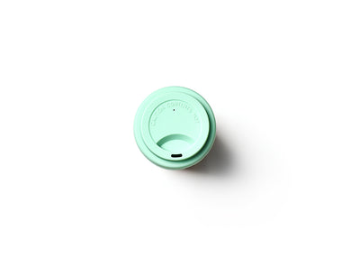 Top View Mint Green Silicone Spill-free Lid on Beaning Travel Mug